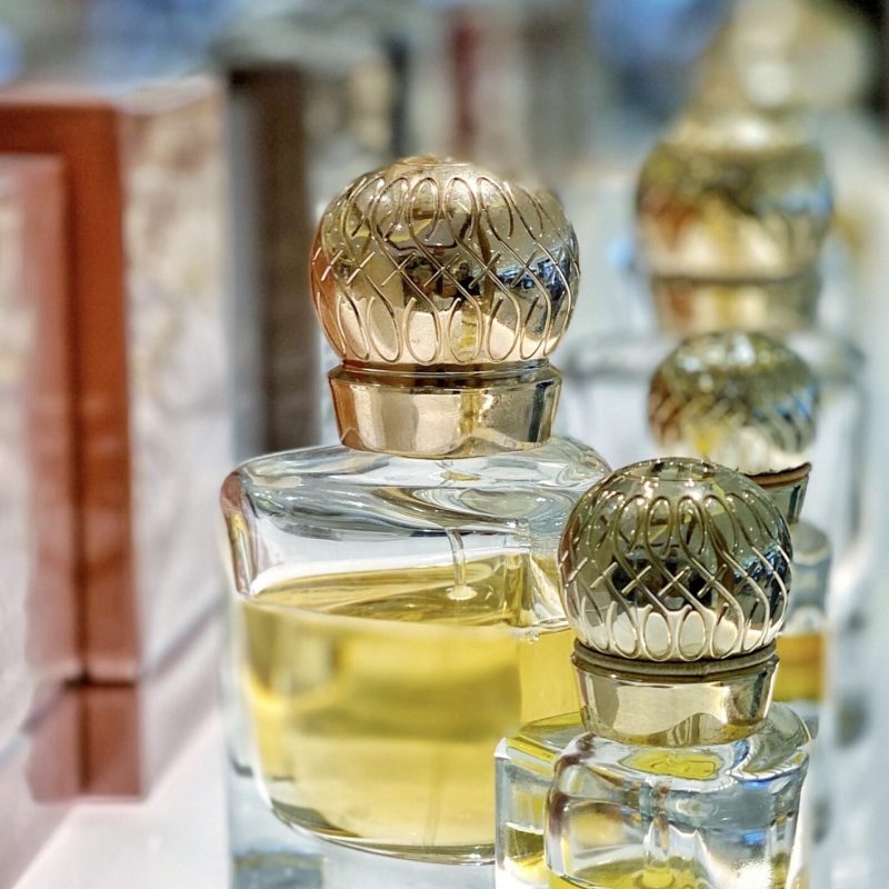 elegant-perfume-bottles-with-gold-finishes-on-disp-2026-03-24-10-17-55-utc
